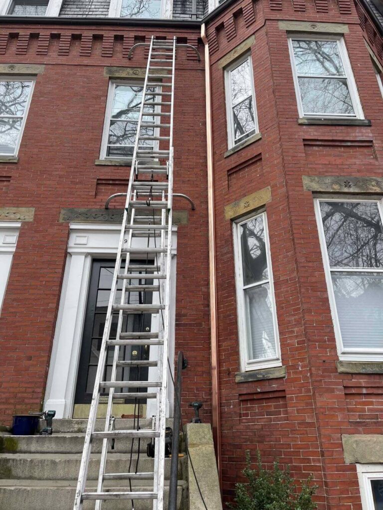 Copper downspout gutter installation - Boston Gutter Solutions