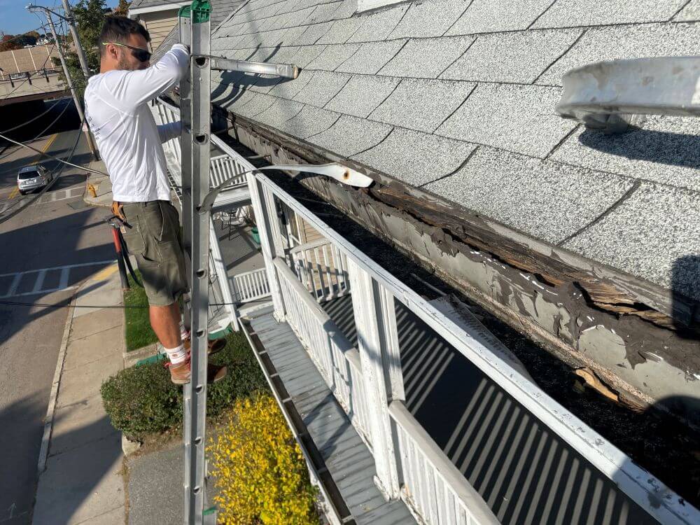 our team during gutter installation process - Boston Gutter Solutions