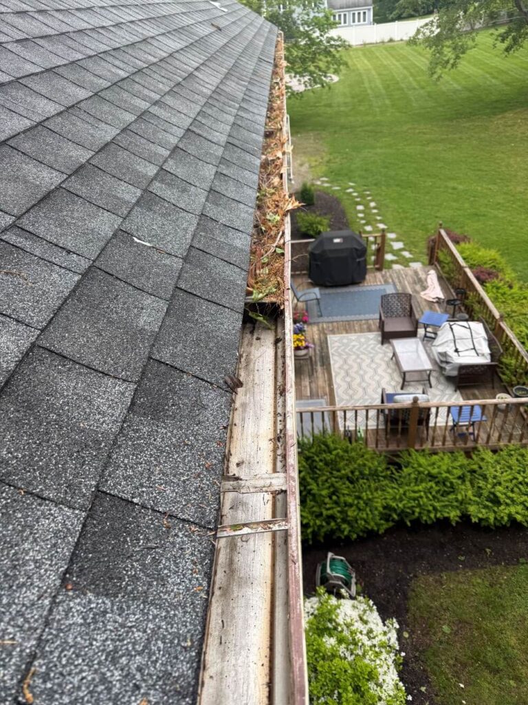 gutter cleaning in progress north andover - Boston Gutter Solutions